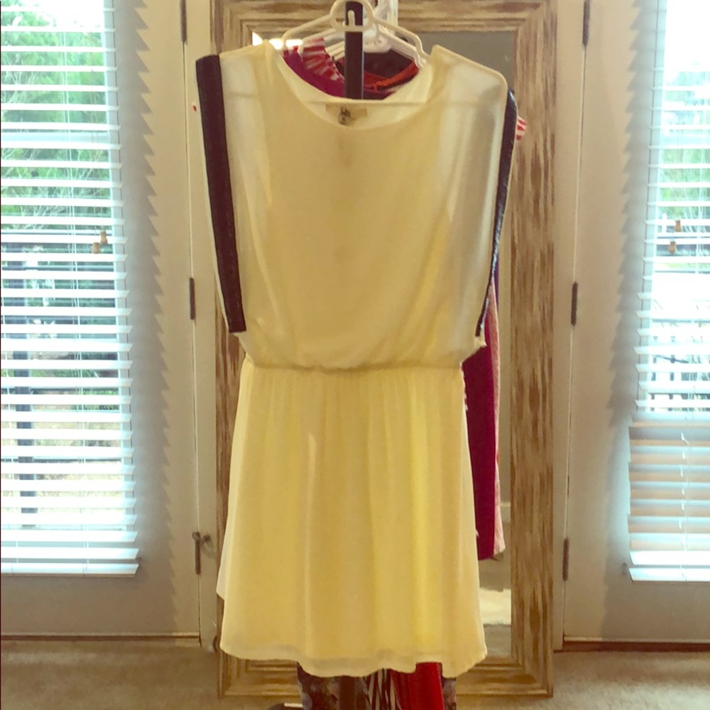 Cream dress with beads on the side